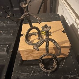 Horse shoe cowboy art sculpture. Set of two